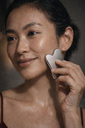 skincare routine using gua sha tool
